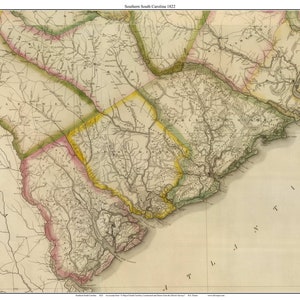 May include: A vintage map of South Carolina from 1822, showing the state's counties and rivers. The map is printed in black, brown, green, yellow, and pink on a white background.