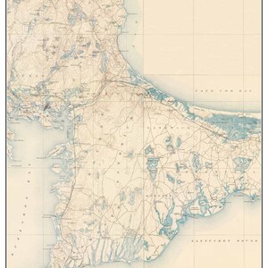 May include: A vintage topographical map of the Upper Cape in 1890. The map shows the coastline of Cape Cod, Massachusetts, with detailed features like rivers, lakes, and towns. The map is printed in brown, blue, and black ink on a cream-colored paper.