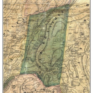 May include: An antique map of North Branford, Connecticut, from 1852. The map is hand-drawn and features a detailed outline of the town's boundaries, including the surrounding towns of North Haven, Northford, and North Guilford. The map is printed on aged paper with a light brown background and green and brown lines.