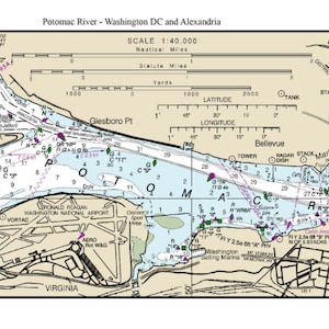 May include: A nautical chart of the Potomac River, showing the waterways from Washington, D.C. to Alexandria, Virginia. The chart includes depth soundings, buoys, and other navigational aids. The chart also includes a scale and a legend.