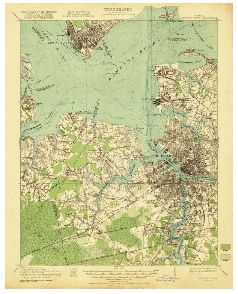 May include: A vintage map of the Hampton Roads area in Virginia, showing the cities of Newport News, Norfolk, and Chesapeake Bay. The map is printed in green, brown, and blue, and includes text labels for various landmarks and waterways.