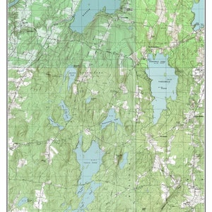 May include: A vintage topographic map of Webber, Three-mile, and Togus Ponds in Maine, circa 1983. The map shows the location of the ponds, roads, and other features. The map is printed in green and brown on a white background.