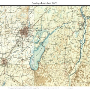 May include: A vintage map of the Saratoga Lake area in New York State, dated 1949. The map shows the lake, surrounding towns, and roads. The map is in shades of blue, green, brown, and beige.