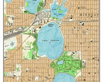 May include: A vintage map of Lake of the Isles, Cedar, Calhoun, and Harriet Lakes in Minneapolis, Minnesota, from 1967. The map shows the lakes, surrounding streets, parks, and other landmarks. The map is in a light brown, green, and blue colour scheme.