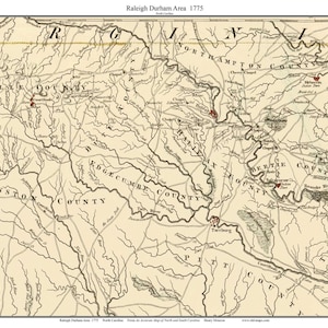 May include: Antique map of the Raleigh Durham Area in 1775, featuring detailed cartography of North Carolina counties. The map is in sepia tones, with text labels and intricate river and road illustrations. The title "Raleigh Durham Area 1775" is at the top.