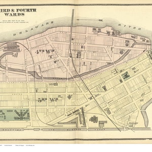 May include: A vintage map of the Third and Fourth Wards of a city, likely from the 19th century. The map is printed in black and white on a cream-colored paper. The map shows the layout of streets and buildings in the area. The map is titled "Third & Fourth Wards" and includes the text "Scale one inch to 100 feet" and "Compiled from a plan by Edward A. Ogden, CE."