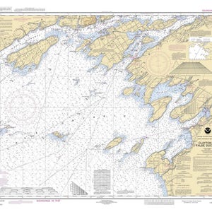 May include: Nautical chart of Clayton to False Ducks, Lake Ontario, New York. The chart shows the shoreline, islands, and depths of the water. The chart is printed in black and white with blue and red accents.
