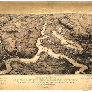 May include: A vintage bird's eye view map of the junction of the Ohio and Mississippi Rivers, showing Cairo and part of the Southern States. The map is drawn in black and white and includes distances from Cairo to other cities.