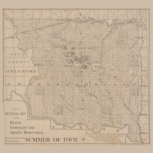 May include: A black and white map of the Kiowa, Comanche and Apache Reservation in Oklahoma. The map is divided into sections with numbers and lines. The text "SUMMER OF 1901" is printed at the bottom of the map.