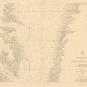 May include: A vintage nautical chart of Chesapeake Bay, showing the coastline and waterways. The chart is printed in black and white on a cream-colored paper. The chart is titled "Chesapeake Bay" and includes a legend and scale.