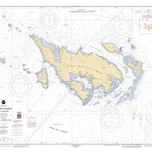 May include: A nautical chart of Isla de Culebra and its approaches, showing the island's coastline, surrounding waters, and various navigational features. The chart includes depth soundings, buoys, and other aids to navigation. The title "Isla de Culebra and Approaches" is printed in the lower left corner.