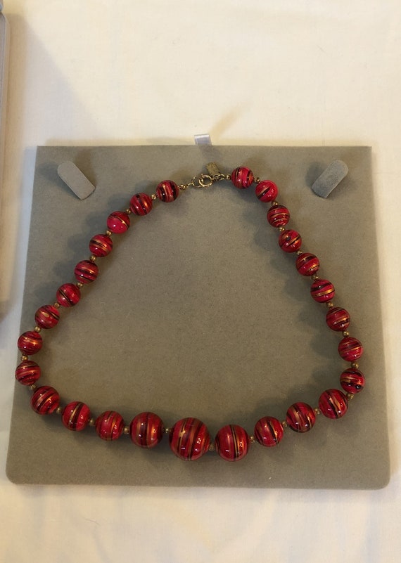 Bergere Bead Necklace Reds with gold & brown strip