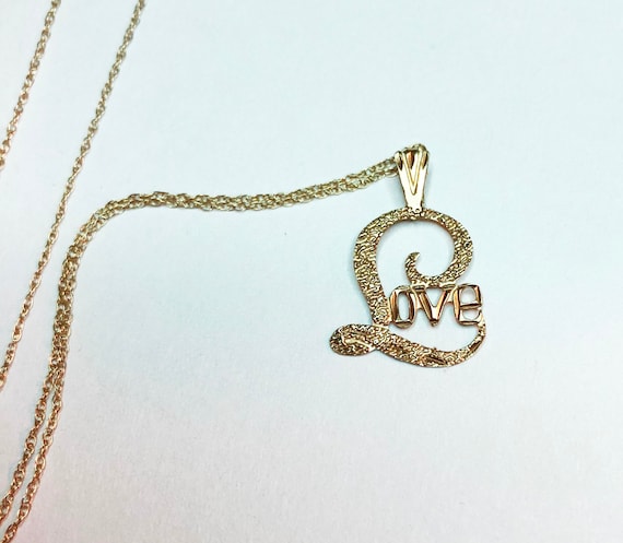 14K Love Necklace the word love on 14K 18" chain