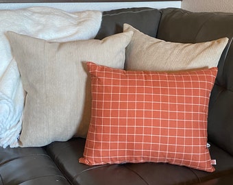 Set di federe per cuscini autunnali: velluto a coste color cuoio e plaid arancione bruciato