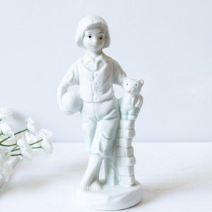 Colonial Boy Figurine With Ball & Teddy Bear Leaning on Brick Wall