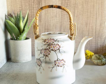 Vintage Made In Japan Porcelain Teapot with Rattan Handle and Hand Painted Pink Cherry Blossoms, Japanese Floral Tea Service Pot with Lid.