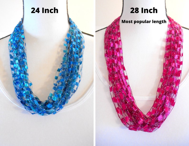 May include: Two crocheted infinity scarves, one in turquoise blue and one in fuchsia pink. The turquoise scarf is 24 inches long and the fuchsia scarf is 28 inches long. The fuchsia scarf is labelled "Most popular length".