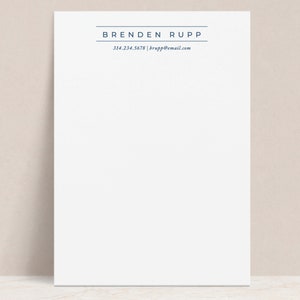 May include: White letterhead with a blue border and the text "BRENDEN RUPP" in all caps. Below the name is the phone number "314.234.5678" and the email address "brupp@email.com".