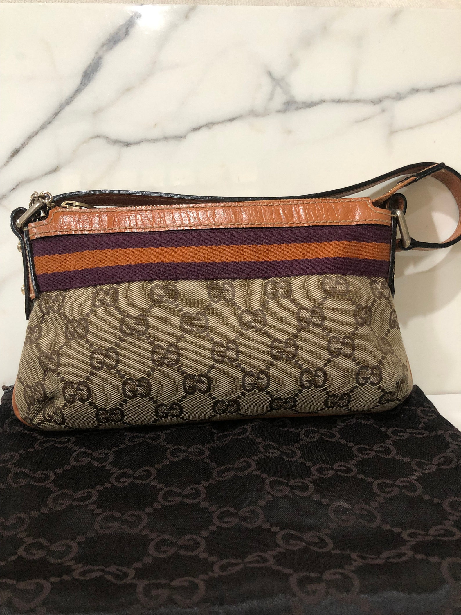 gucci monogram pochette