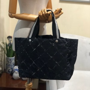 chanel black travel line tote