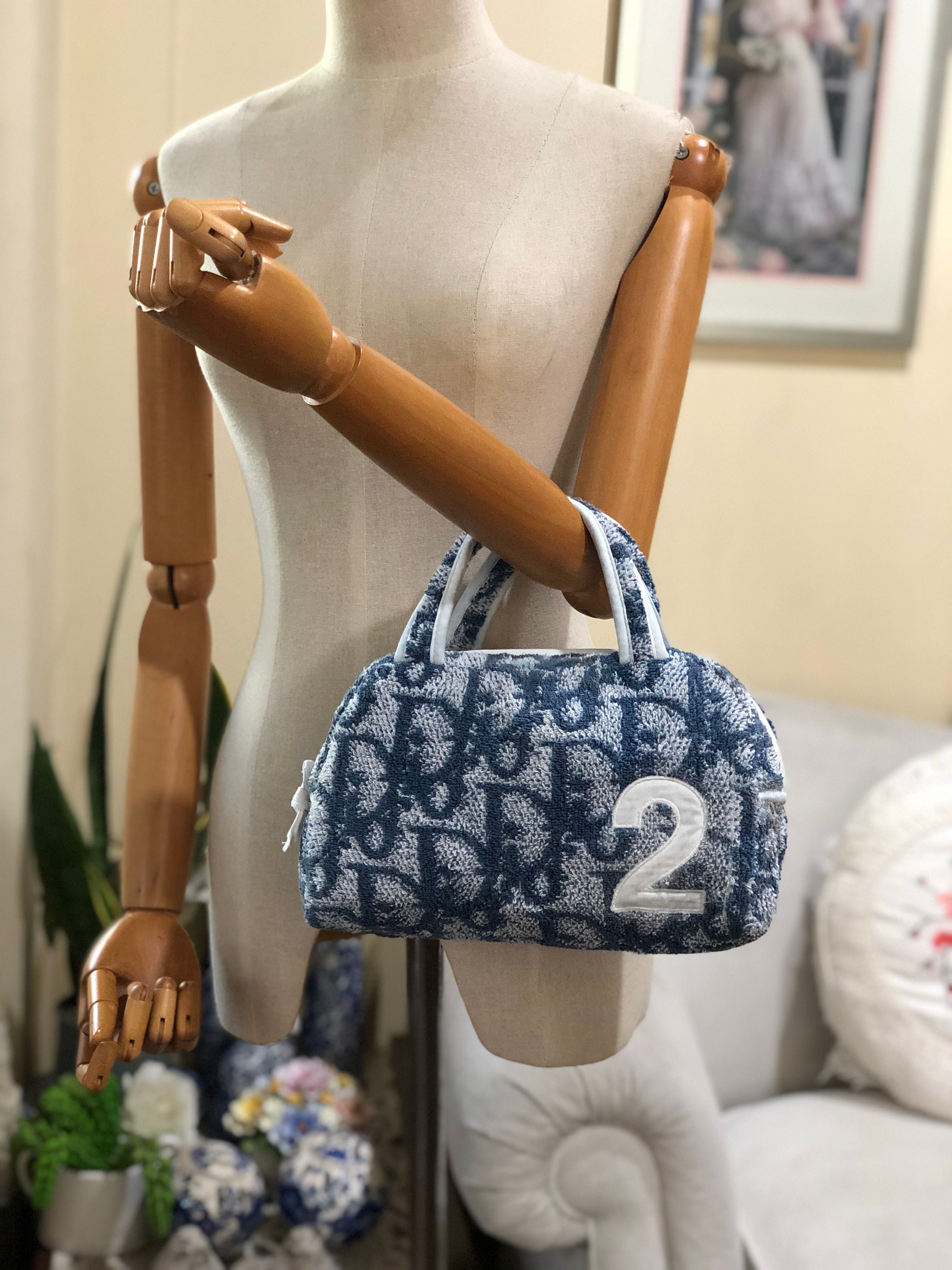 dior terry cloth bag Cinosural International School