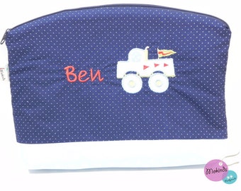 Toiletry bag with the name Truck dark blue dots