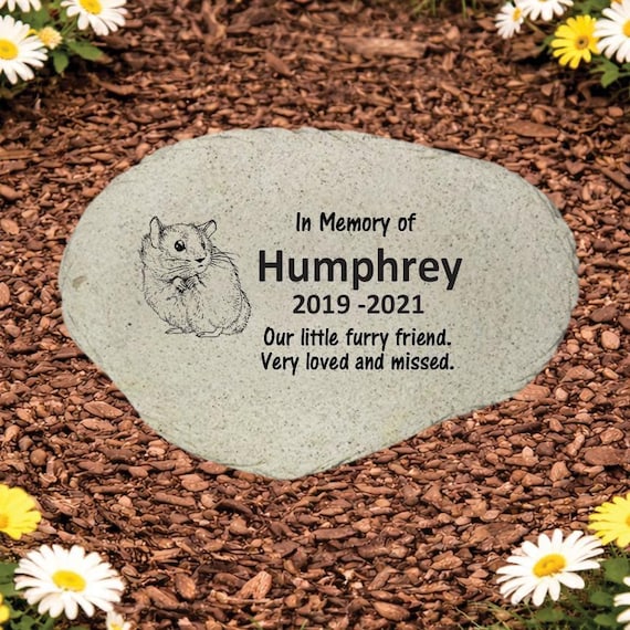 A personalized garden stone for a hamster — hyper-specific micro-niche that perfectly hits the 'I thought of you exactly' gift feeling for a grieving small-pet owner.