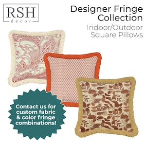 May include: Three square pillows from the RSH décor Designer Fringe Collection. One features a red paisley pattern with cream fringe, one has a geometric orange pattern with orange fringe, and one has a brown leaf print with tan fringe.