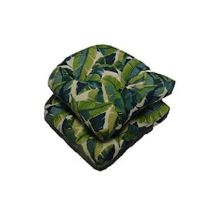 May include: Three stackable square outdoor chair cushions with a tropical leaf pattern in shades of green and blue.
