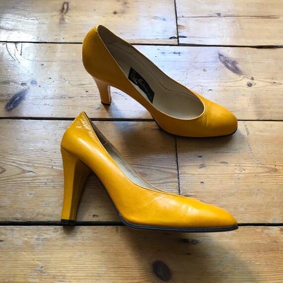 mustard colored high heels