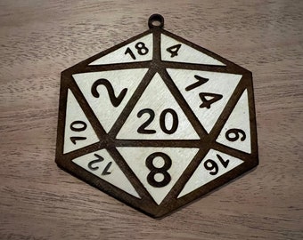 May include: A wooden 20-sided die with numbers 2, 4, 6, 8, 10, 12, 14, 16, 18, and 20 printed on the faces. The die is brown with a white background.