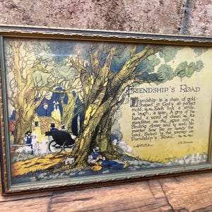 Antiker gerahmter Druck von 1925 von “Friendship’s Road” von J.B. Downie - Copyrighted by The Buzza Co. Minneapolis - Sammlerbare Art-Deco-Drucke