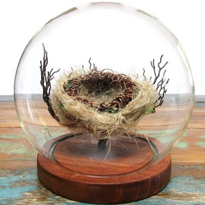 Nest, Copper, flax and thread nest, cradled in wire branches.