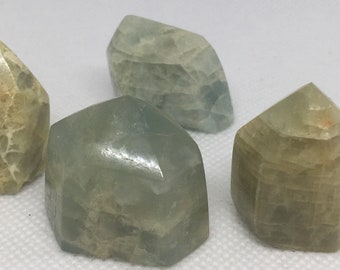 Aquamarine Premium Small Standing Polished Points,Aquamarine is a stone of courage, its calming energies reduce stress and quiet the mind.