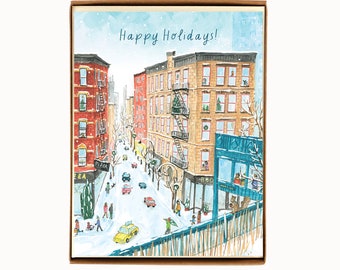 May include: A snowy city street scene with red brick buildings, a yellow taxi cab, and pedestrians walking. The text "Happy Holidays!" is at the top of the card.