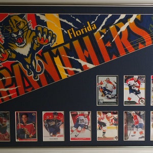 Rétrospective des fanions et cartes de hockey des Panthers de la Floride... encadré sur mesure !!!