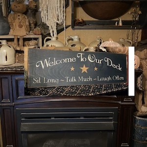 Welcome to our deck primitive sign