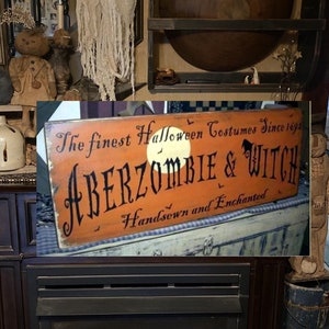 aberzombie and witch Primitive Sign