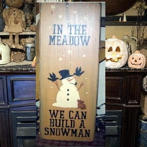 In the winter we can build a snowman  Christmas Primitive Sign