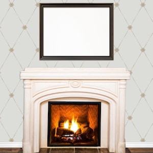 May include: A white marble fireplace with a black metal firebox and a roaring fire. The fireplace is set against a white wall with a diamond pattern wallpaper.