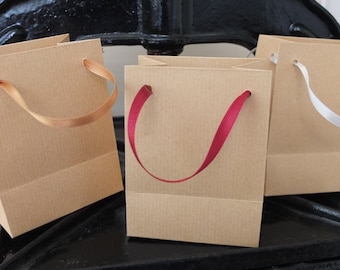 Extra small natural brown kraft paper bags. Hand made. Pack of 100.