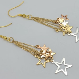 Gold and Silver Dangle Star Earrings