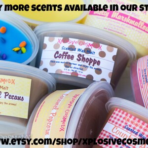 May include: Assortment of scented wax melts in various colors and scents, including Gooey Caramel Pecans, Coffee Shoppe, Campfire Nights, and Caramel Popcorn. The wax melts are packaged in clear plastic containers with labels featuring the scent name and the company logo, XPLOSIVE COSMETIX. The website address www.etsy.com/shop/XPLOSIVECOSMETIX is printed on the bottom of the image.