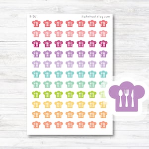 May include: A sheet of 72 colorful chef hat stickers with a white outline and a fork, knife, and spoon inside. The stickers are arranged in rows of 8, with each row featuring a different color. The colors are pink, red, purple, blue, green, yellow, orange, and peach. The sheet is labeled "B-261" and "itsAwhoot.etsy.com".
