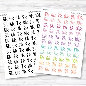 May include: Two sheets of stickers with the text "5k 6k 7k 8k 9k 10k" in various colors. One sheet has black text, the other has text in shades of pink, orange, green, and purple. The stickers are for planning and organization.