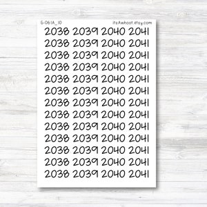 May include: A sheet of black and white year stickers with the years 2038, 2039, 2040, and 2041 repeated on each sticker. The text "itsAwhoot.etsy.com" is printed in the top right corner of the sheet.