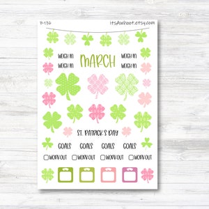 May include: A printable sheet of stickers featuring shamrock designs in green and pink. The sheet includes the word "March" and the phrase "St. Patrick's Day". There are also stickers for "Goals", "Workout", and "Weigh In".