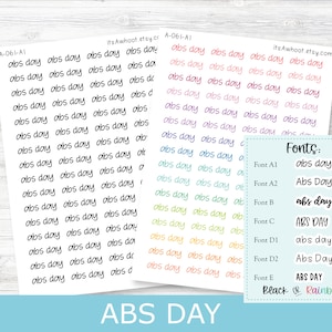 May include: A sheet of stickers with the text "ABS DAY" written in various fonts and colors. The fonts include "abs day", "Abs Day", "abs day", "ABS DAY", "abs day", "Abs Day", "ABS DAY". The colors include black, rainbow, pink, blue, green, yellow, and orange.