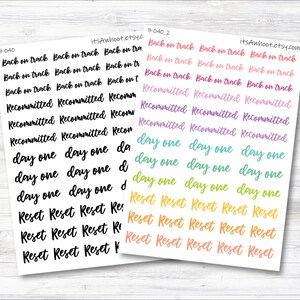 May include: A sheet of colorful planner stickers with the words "Back on Track", "Recommitted", "Day One", and "Reset" repeated in different colors. The stickers are designed for use in a planner or journal.