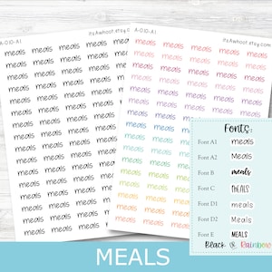 May include: A sheet of stickers with the word "meals" written in different fonts and colors. The fonts include "meals", "Meals", "meals", "MEALS", "meals", "Meals", and "MEALS". The colors include black, pink, blue, green, yellow, and orange.